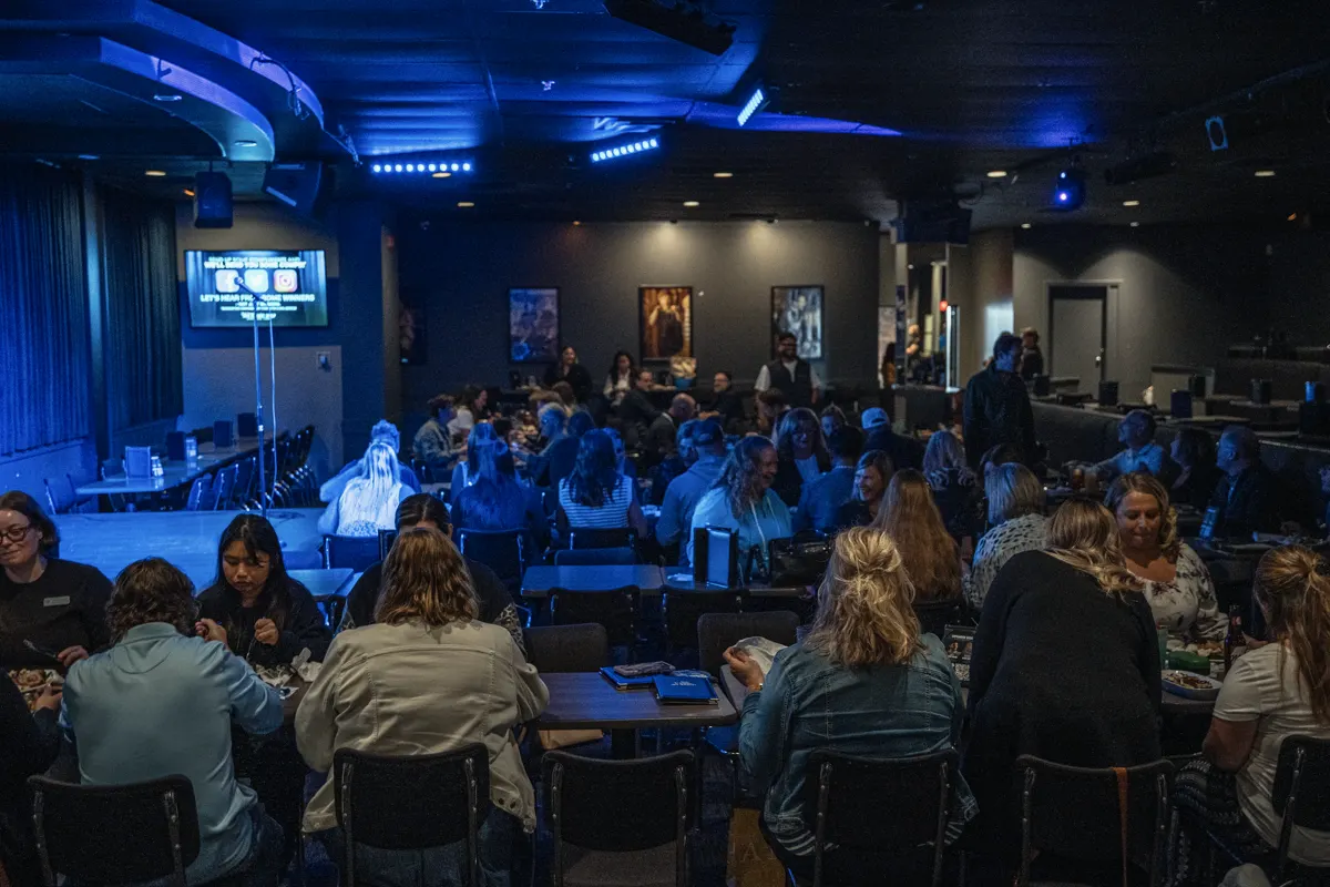 Full room with blue stage lighting