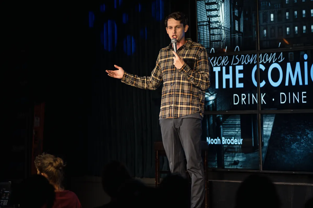 Comedian performing, great lighting