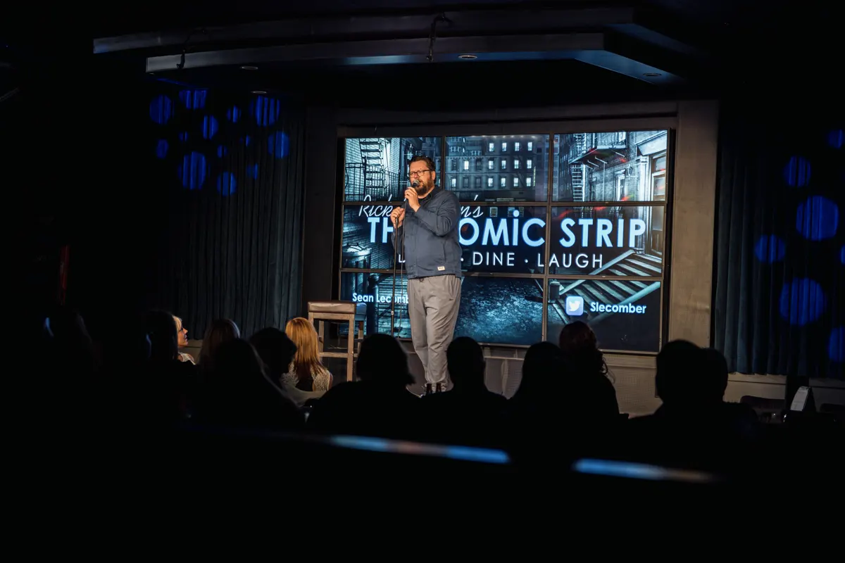 Comedian performing at the mic